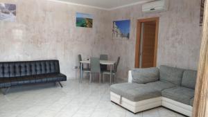 A seating area at Casa vacanza bella Puglia