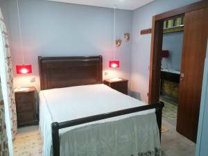 Posteľ alebo postele v izbe v ubytovaní Casinha da Mó