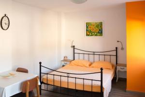 Postel nebo postele na pokoji v ubytování Apartment Teuta