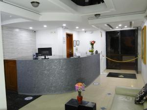 TV a/nebo společenská místnost v ubytování Hotel Esmeralda Plaza
