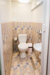 Ένα μπάνιο στο Апартаменти на площі Ринок +11 φωτογραφίες