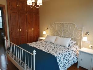 Postel nebo postele na pokoji v ubytování La Casa Roja Asturias
