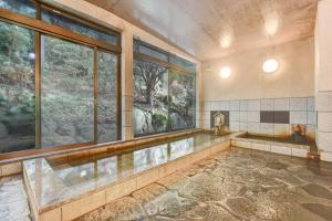 Bazén v ubytování 湯迫温泉旅館 nebo v jeho okolí