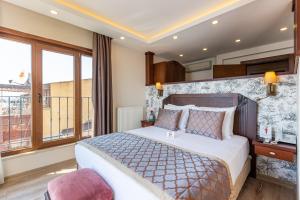 MENAR HOTEL&SUITES -Old City Sultanahmet客房内的一张或多张床位