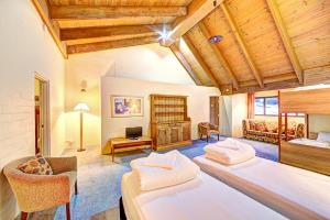 Postel nebo postele na pokoji v ubytování Snow Ski Apartments Extra Spacious 41