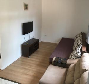 Posezení v ubytování Casa com varanda próximo da Natureza