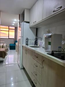 A kitchen or kitchenette at Flat Sol Victoria Marina Vista Mar