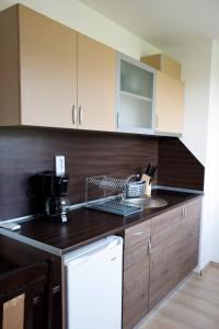 a kitchen with a sink and a counter top at studio ASI in Obzor