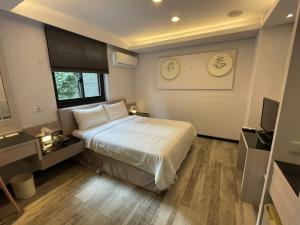 Letto o letti in una camera di 微光宿 LIGHt