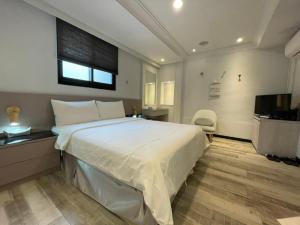 Letto o letti in una camera di 微光宿 LIGHt