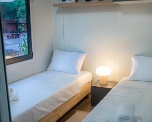 Postel nebo postele na pokoji v ubytování Mobile Homes Vrata Krke