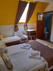 Ένα ή περισσότερα κρεβάτια σε δωμάτιο στο Casa EMY
