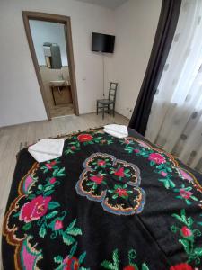 Postel nebo postele na pokoji v ubytování Casa Pandrea