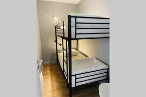 Katil atau katil-katil dalam bilik di Appartement lumineux à 300m de la mer