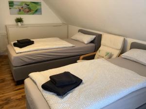 En eller flere senge i et værelse på Apartment Wuhrt