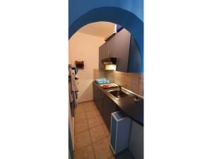 Kuchyň nebo kuchyňský kout v ubytování Blue Sea Vir Apartments