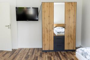 TV a/nebo společenská místnost v ubytování Schöne Ferienwohnung in Oberkotzau am Fichtelgebirge