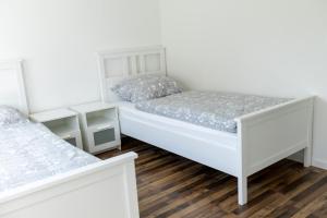 Postel nebo postele na pokoji v ubytování Schöne Ferienwohnung in Oberkotzau am Fichtelgebirge