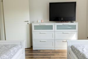 Postel nebo postele na pokoji v ubytování Schöne Ferienwohnung in Oberkotzau am Fichtelgebirge