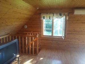TV a/nebo společenská místnost v ubytování Aratsaare Holiday home
