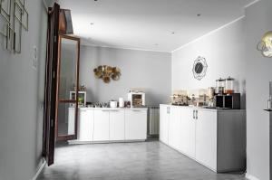 Kuchyňa alebo kuchynka v ubytovaní Golden Milano Hotel