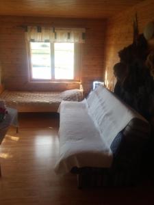 Postel nebo postele na pokoji v ubytování Aratsaare Holiday home
