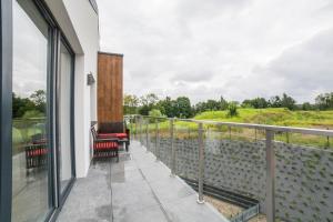 Ogród w obiekcie Apartament Klimt nad jeziorem Juno w Mragowie