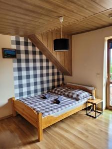 Кровать или кровати в номере Na Równej Bieszczady