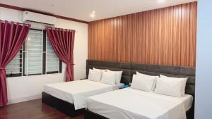 Postel nebo postele na pokoji v ubytování Hotel Red River + 21 fotografií