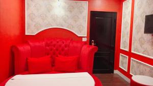 Rúm í herbergi á Hotel Red River