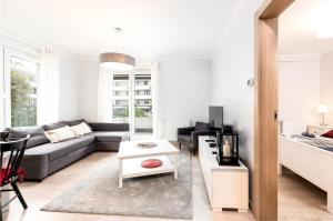 Et opholdsområde på Apartament Mio Mare + 19 billeder