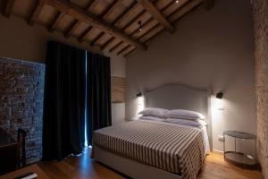 Letto o letti in una camera di Sei Sequoie Nature & Charme