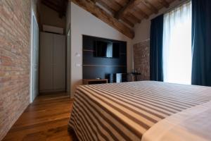 Letto o letti in una camera di Sei Sequoie Nature & Charme