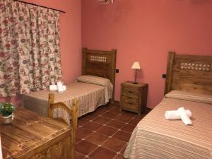 La venta el Membrillo tesisinde bir odada yatak veya yataklar