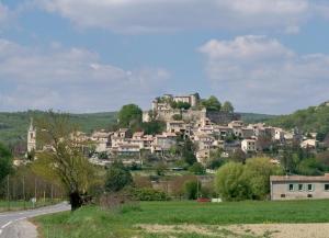 a small village on a hill with a road at Chez Calou in Mane