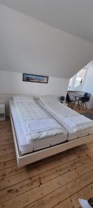 Postel nebo postele na pokoji v ubytování Korsør Room
