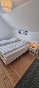 Postel nebo postele na pokoji v ubytování Korsør Room