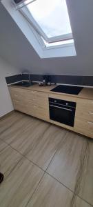 Kuchyň nebo kuchyňský kout v ubytování Korsør Room