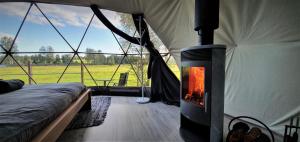 Postel nebo postele na pokoji v ubytování Glamping DiDille