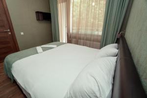 A bed or beds in a room at Villa Lapa