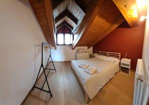 Posteľ alebo postele v izbe v ubytovaní Appartamento Residenza Lavinia