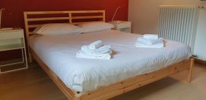 Posteľ alebo postele v izbe v ubytovaní Appartamento Residenza Lavinia