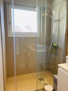 Bilik mandi di Appartement lumineux à 300m de la mer
