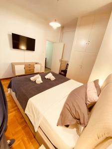 Posteľ alebo postele v izbe v ubytovaní Studio 32m2 Nefitou Metaxa + 12 fotografií