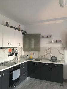 Kuchyň nebo kuchyňský kout v ubytování Loukas House 2 + 13 fotografií