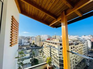 a balcony with a view of a city at Zen Apartment in the center of Tangier in Tangier
