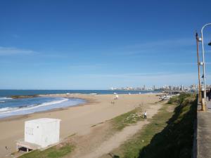 a view of a beach with people walking on it at FLAT MUSEO MAR in Mar del Plata