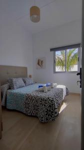 Posteľ alebo postele v izbe v ubytovaní Villa La Asomada, Playa Blanca