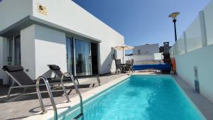 Bazén v ubytovaní Villa La Asomada, Playa Blanca alebo v jeho blízkosti
