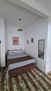 Postel nebo postele na pokoji v ubytování Pousada Sombrero